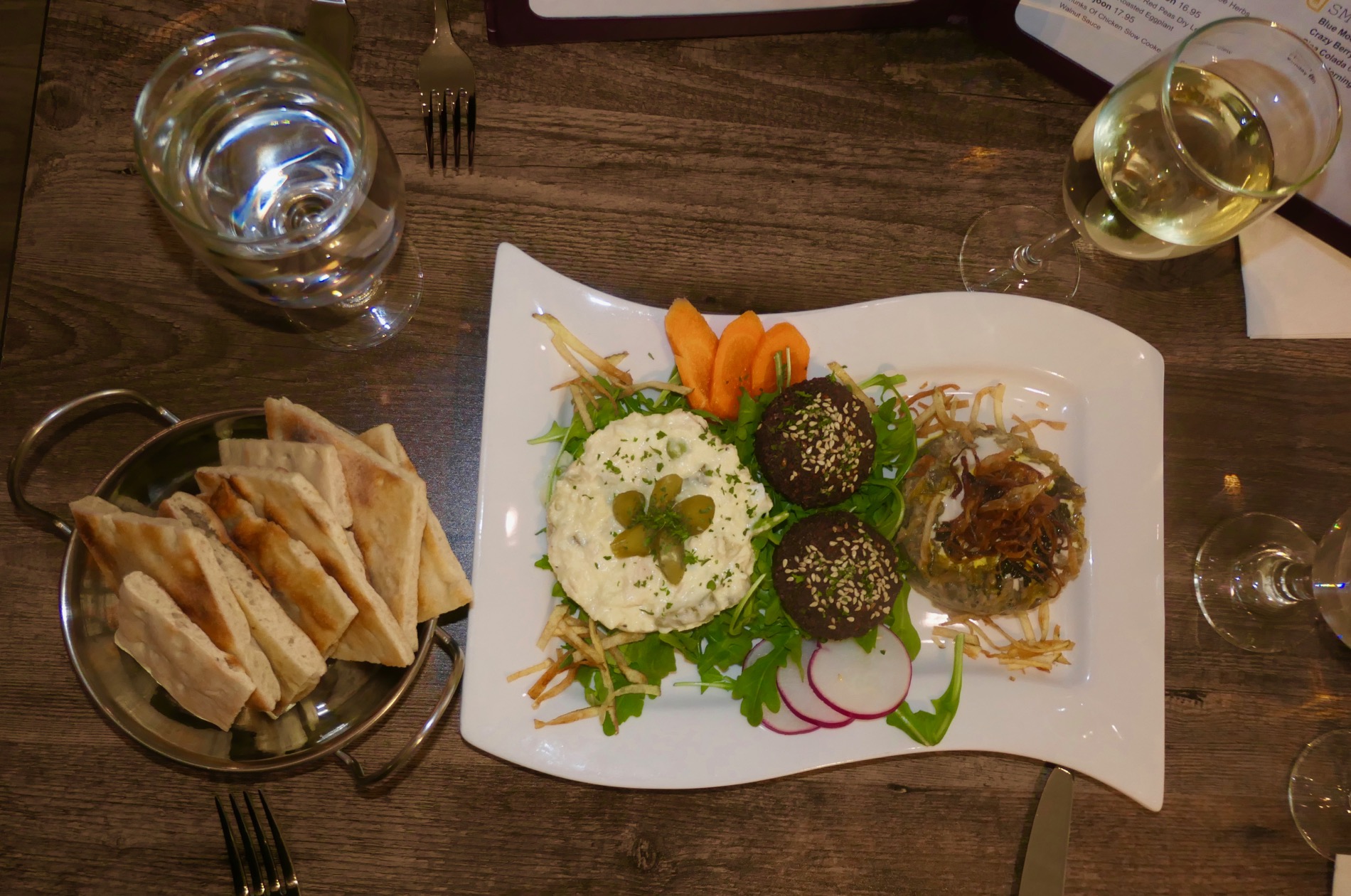 Trio of appetizers with pita