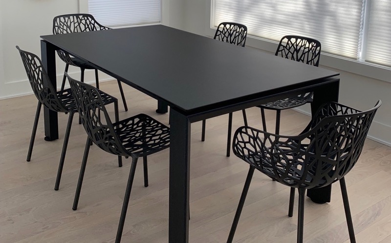 Janus et Cie Forest chairs with Calligaris Omnia table in graphite