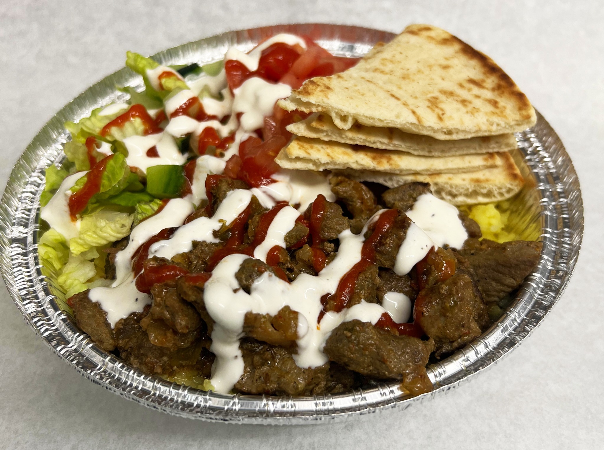 Halal lamb and rice bowl