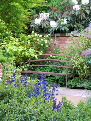 A bench is perfect for a narrow garden. 