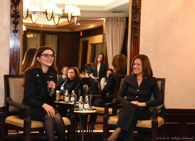 Kosovo Amb. Vlora Citaku (left) is interviewed by CARE&#039;s Beth Solomon