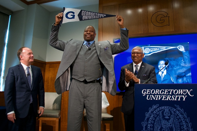 Ewing in the middle; Georgetown U. President John J. DeGiola (left) and Georgetown Athletic Director Lee Reed