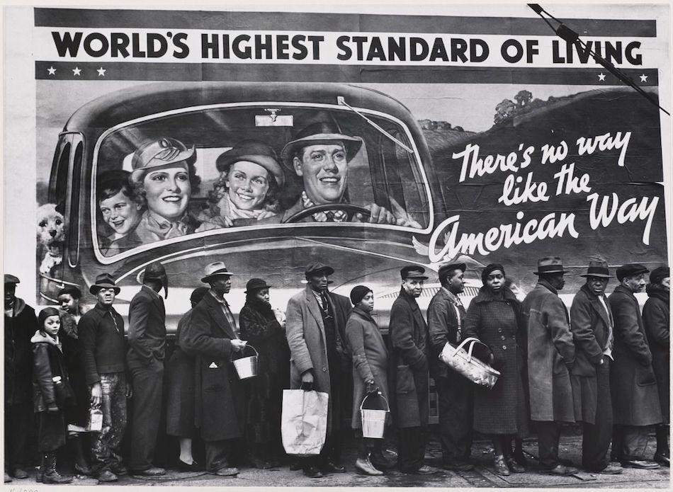 Queue of black residents of Louisville KY waiting for distribution of relief supplies during the 1937 Ohio River flood