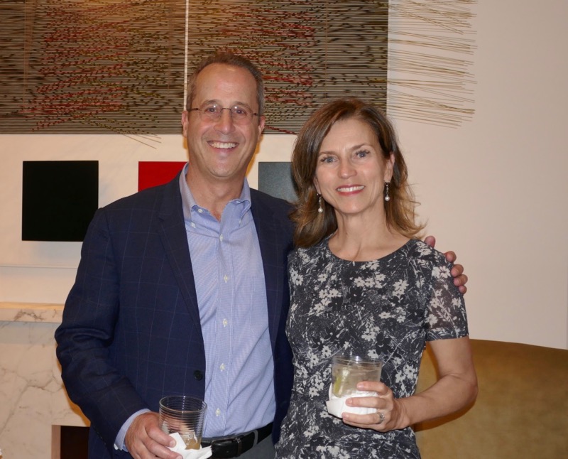 Josh and Lisa Bernstein in front of Jesus Rafael-Soto&#039;s Haut Vibracion, Verde Y Roja, 1990