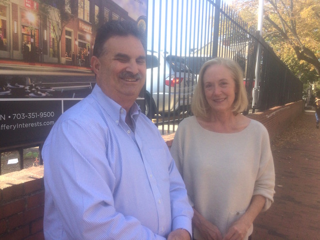 Commissioner Bill Starrels and Victoria Rixey visit the Doggetts parking lot, future home of a proposed retail building.