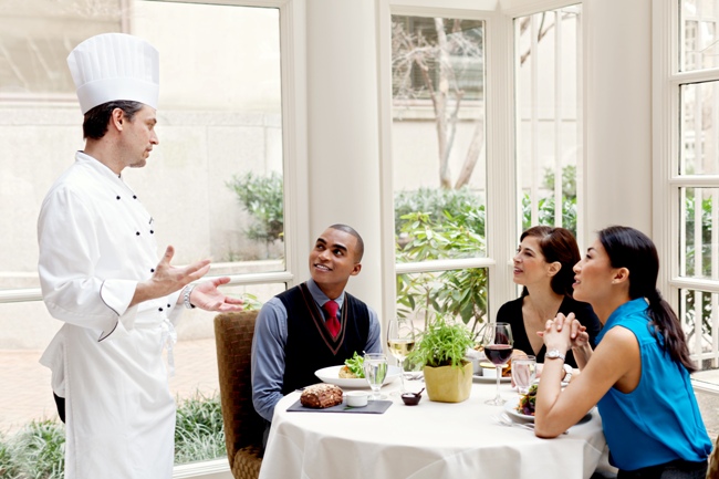 Juniper Chef Ian Bens with guests