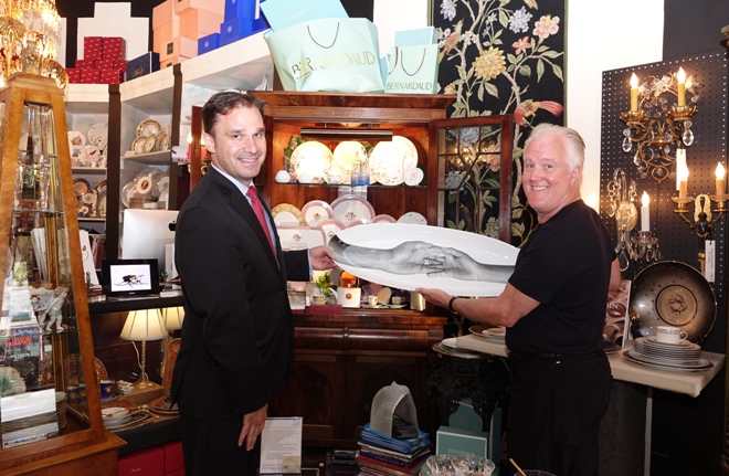 Bernardaud&#039;s Yann Rowland and Consider It Done owner Timothy Albrecht with Bernardaud platter