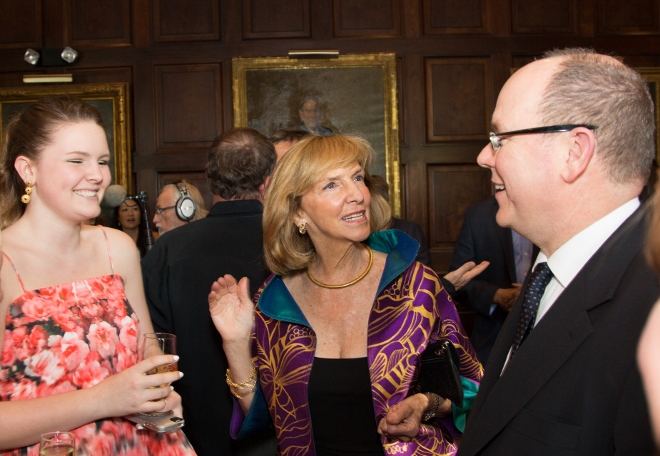 Wendy Benchley (center) chats with H.S.H Prince Albert II and at left her granddaughter Kate Turner