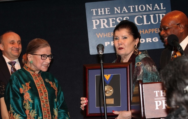 Justice Ginsburg receives award from Judith Terra;  Mark Farr (left); Willie E. Gary