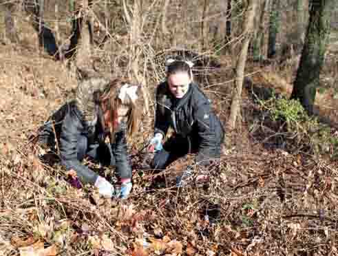 Catholic University students participated in a 2015 cleanup at Dumbarton Oaks Park, which recently received a $320,000 grant.