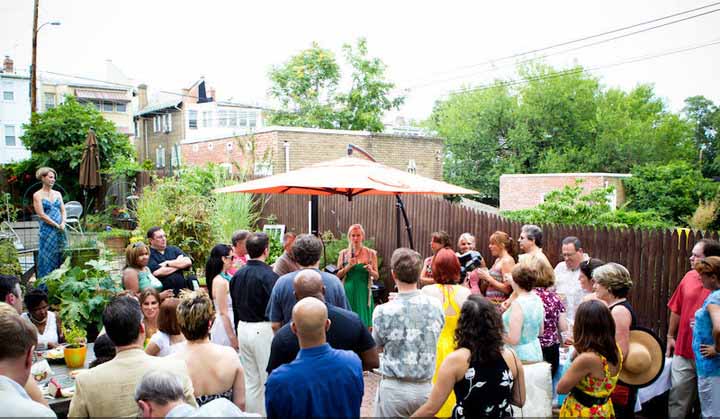 Guests gathered in the garden at Chef Todd &amp; Ellen Kassoff Gray to benefit FAIR Fund