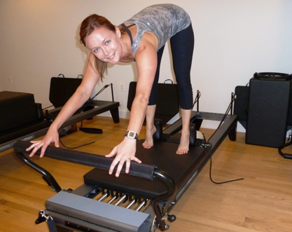 Kelly Griffith on Fuel Pilates reformer