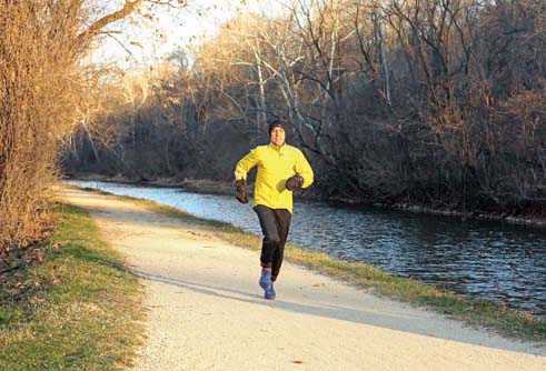 Henry Wigglesworth jogs on the C&amp;O Canal’s towpath near his Palisades home — part of the route for an upcoming weekly 5K race.