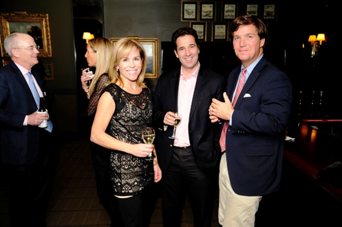 Page Evans with Stephane Carnot and Tucker Carlson at the George Town Club