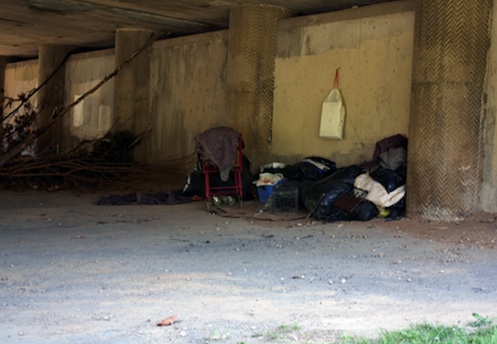 Homeless encampment under a bridge in Georgetown