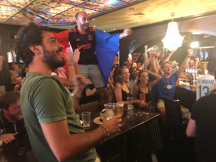 Marseille revelers celebrate the first World Cup Finale goal at The Queen Victoria Pub at the Old Port