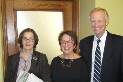 Middle C Music owner Myrna Sislen (center) with Councilmembers Mary Cheh and Jack Evans