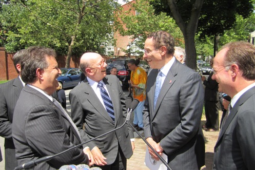 Bill Starrels, Ron Lewis, Mayor Gray and GU President DeGioia share a light moment after the campus planagreement was announced