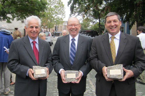 Commissioners Ed Solomon, Ron Lewis and Jeff Jones with commemorative pavers presented at the September ribbon-cutting