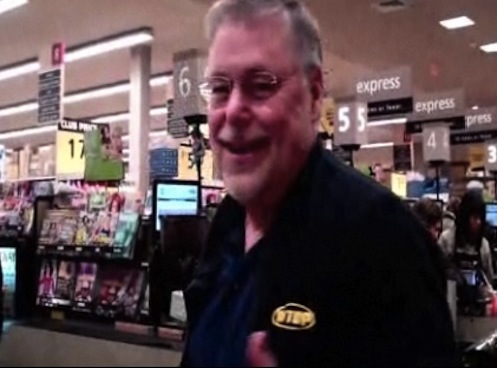 Bob Madigan helps the Washington Humane Society by serving as a celebrity bagger at the Social Safeway