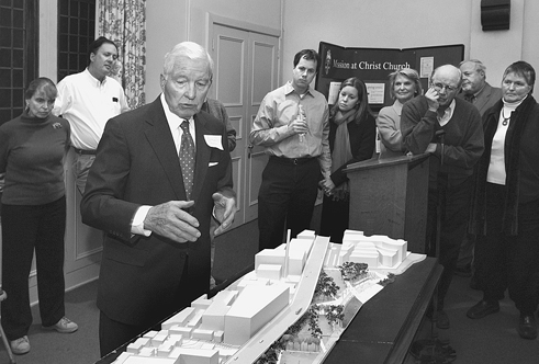 Sen. Charles Percy is shown presenting a model of the proposed Georgetown Waterfront Park during a 2004 community meeting.
