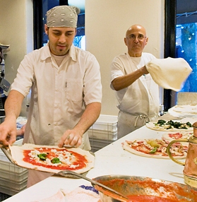 Executive Chef Antonio Biglietto (left) and il Canale owner Joe Farruggio make pizza
