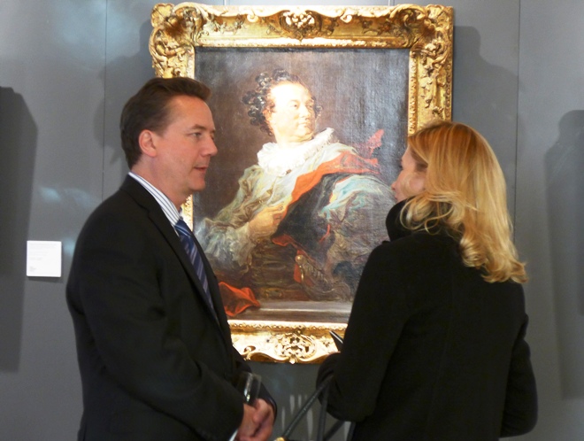 Martin Gammon and guest in front of Fragonard portrait