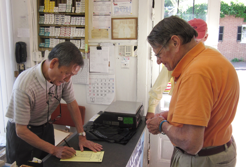 Retiring owner Shin Lee, above left, on his last day at Scheele’s