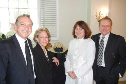 Friend Elliot Epstein (left) with Mary Bird, Felicia's favorite hat, the Rev. Sarah Duggin, who officiated, and Richard Mortimer