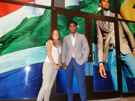 Corina Baldwin and Nish de Gruiter outside the Georgetown Suitsupply