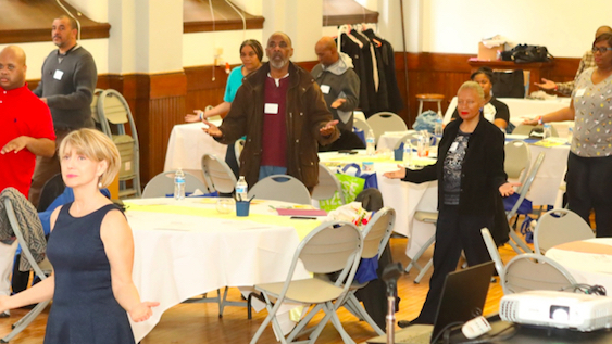 Katherine opening her community Nutrition, Health &amp; Wellness class with Tai Chi