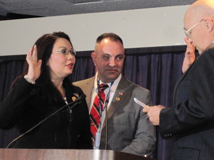 Tammy Duckworth (D-IL), her husband, and Judge Jack Farley