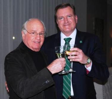 Shelly Gorland (left) Toasts Beasley&#039;s Success with Jim Bell