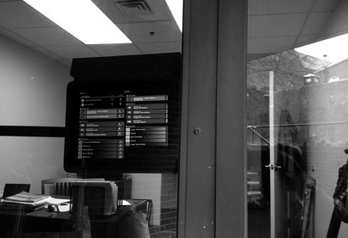 The display screens would go inside windows of participating businesses near bus stops.