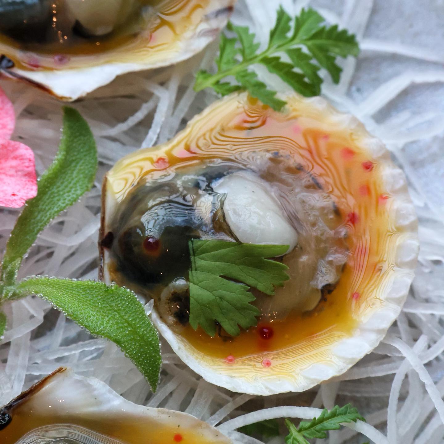 Scallop with mango tobiko.