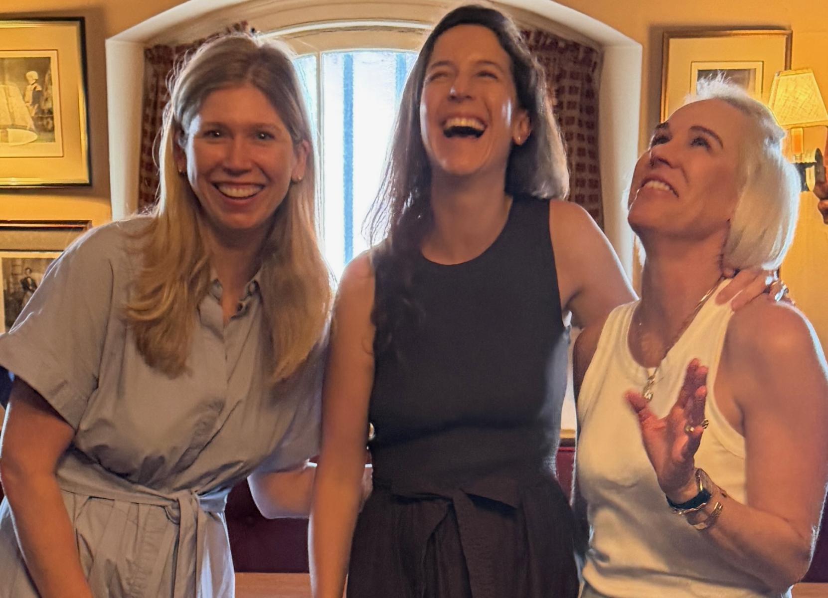 Amy Kuhnert, Libby Cox, and Elizabeth Miller gather at the City Tavern to finalize plans for this year’s celebration The 1751 Party.