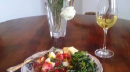 Organic greens, French Chardonnay, and ranunculus