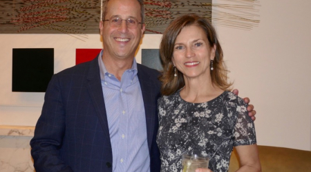 Josh and Lisa Bernstein in front of Jesus Rafael-Soto&#039;s Haut Vibracion, Verde Y Roja, 1990