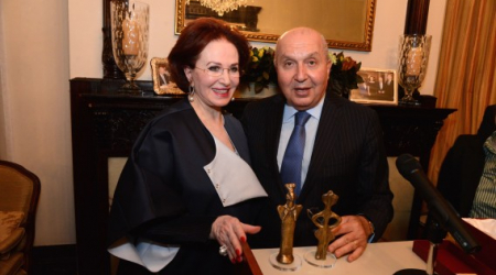 Dr. Maha El-Khalil Chalabi, General Secretary, International Association to Save Tyre presents artifacts from Tyre to H.E. Antoi