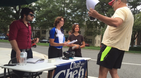 D.C. Councilmember Mary Cheh listens to an upset consituent, flanked by aide Anthony Cassillo and a Georgetown Dish reporter