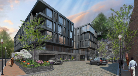 EastBanc is pitching a modern five-story condo building at the site of the M Street Exxon.