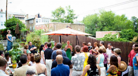 Guests gathered in the garden at Chef Todd &amp; Ellen Kassoff Gray to benefit FAIR Fund