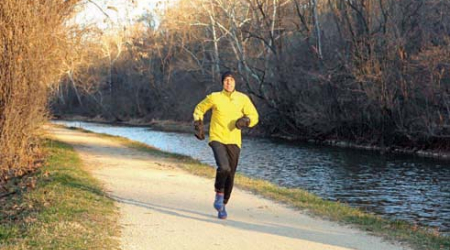 Henry Wigglesworth jogs on the C&amp;O Canal’s towpath near his Palisades home — part of the route for an upcoming weekly 5K race.