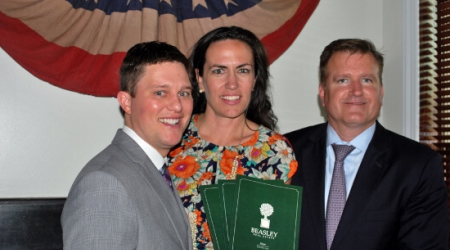 Beasley partner Trent Heminger (left), marketing director D'Ann Lanning &amp; Jim Bell