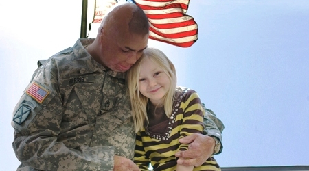 SSG Shilo Harris (U.S. Army, Ret.), pictured with his daughter Elizabeth, begins a new career as a franchise business owner thi