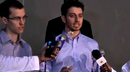 Freed hikers speak to reporters after landing in Oman