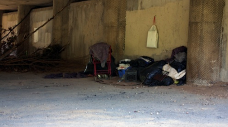 Homeless encampment under a bridge in Georgetown