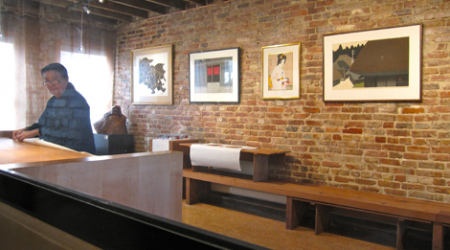 Izumi Yoshimoto attending to her gallery, Gallery Chez M