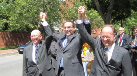 ANC Chair Ron Lewis, Mayor Gray and GU President DeGioia celebrate the agrement