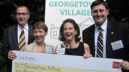 Jessica Townsend (second from left) and Sharon Lockwood with the check from Wells Fargo&#039;s Bob Chlebowski and Shane McLaughlin